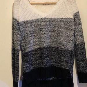 V-neck, knit, drop shoulders, long sleeve sweater.